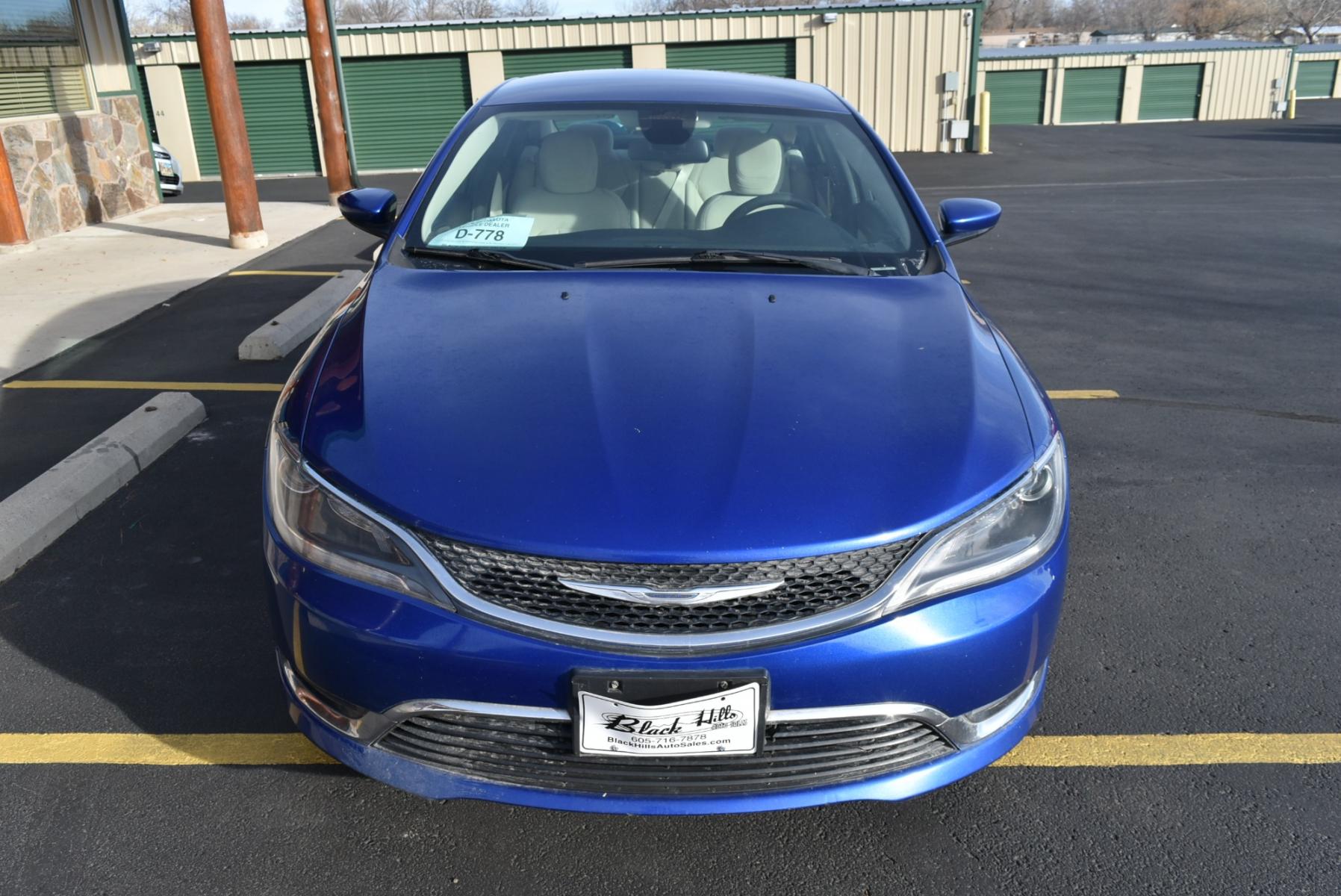 2016 Blue /Beige Chrysler 200 Limited (1C3CCCABXGN) with an 2.4L 4 Cyl Multiair engine, 9-Speed Automatic transmission, located at 1600 E Hwy 44, Rapid City, SD, 57703, (605) 716-7878, 44.070232, -103.171410 - Photo #1